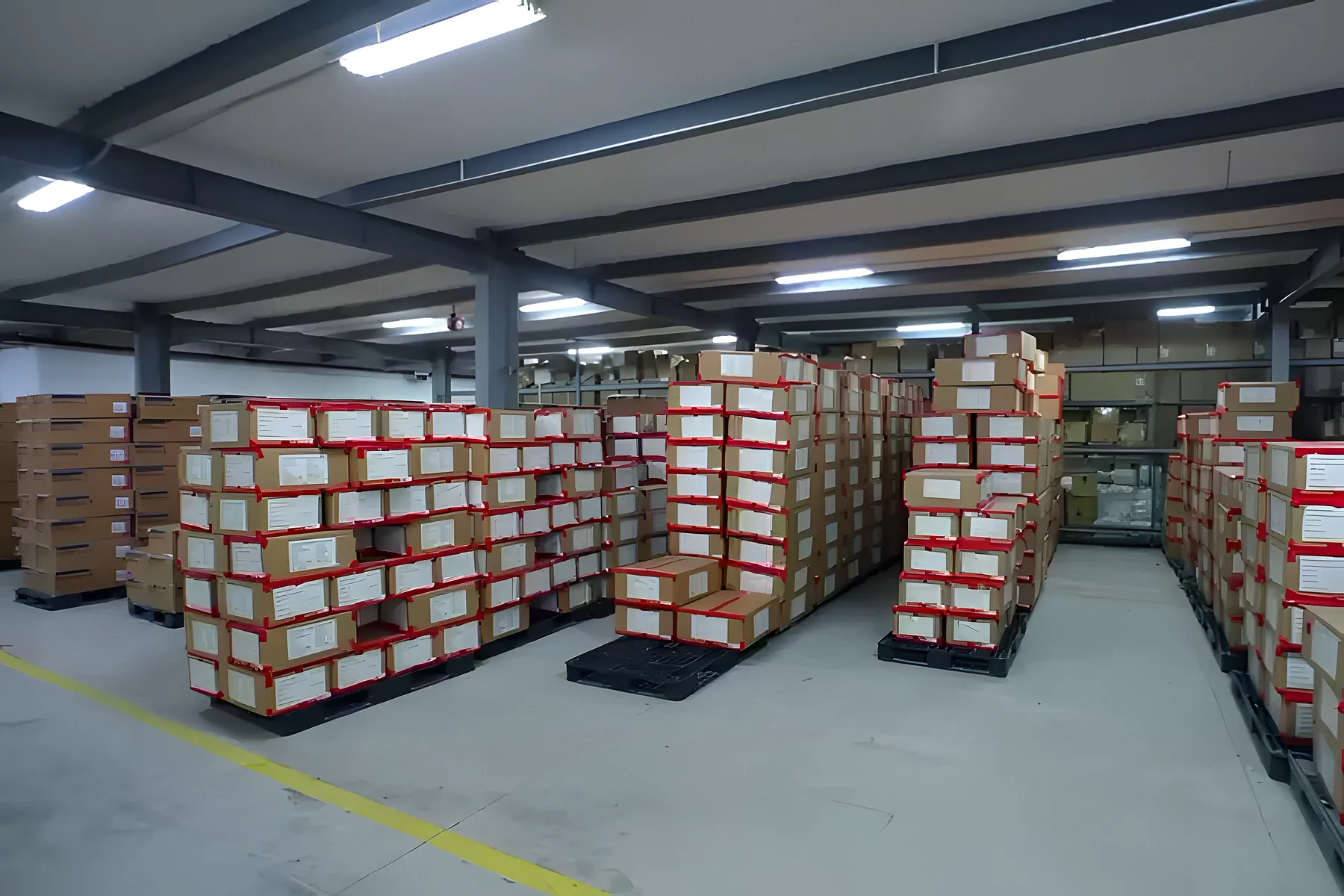 Export cartons stacked on pallets in the finished-goods warehouse